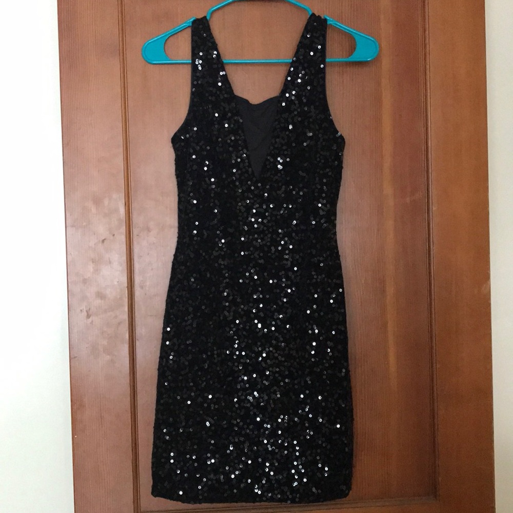 Velvet, glittery dress with mesh v-neck